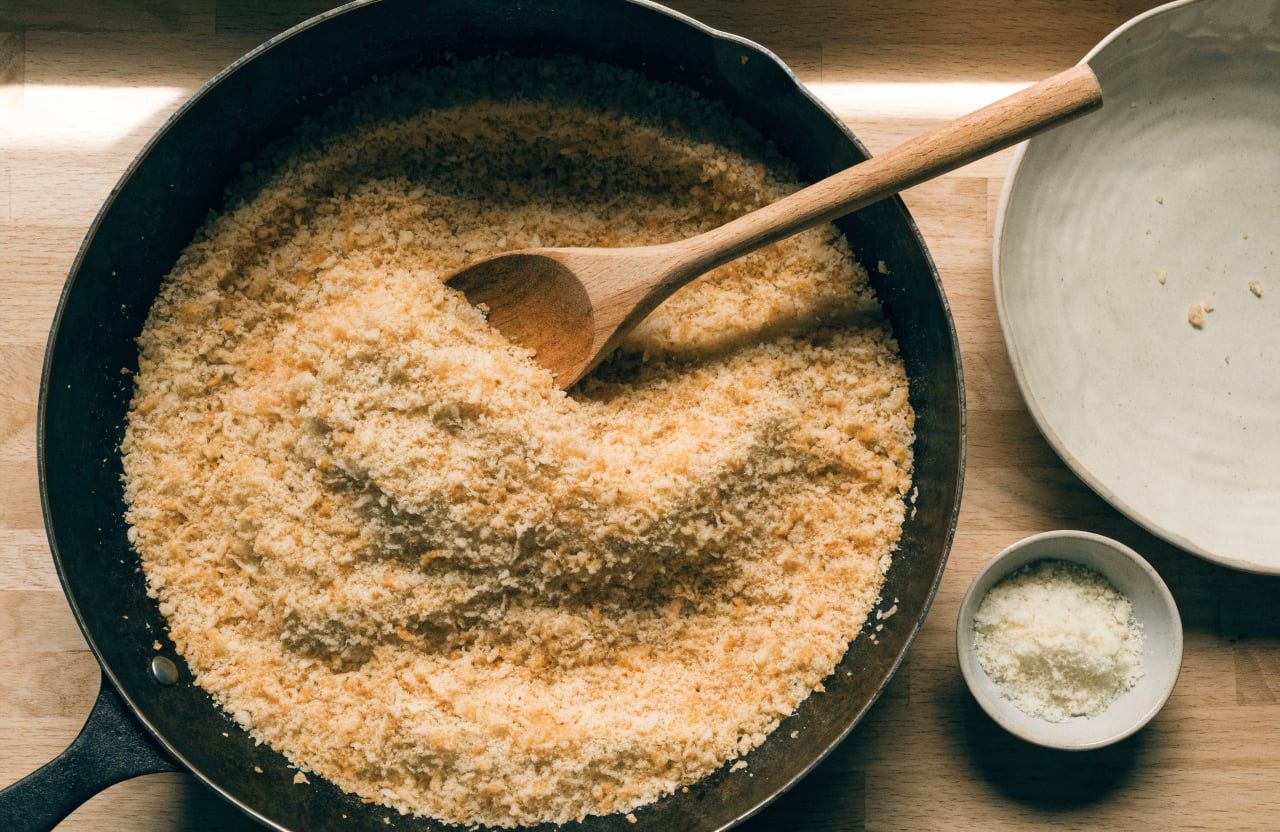 Evenly golden toasted panko breadcrumbs in a large skillet